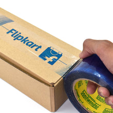 Roll of blue tape with Flipkart lMetomart online Store for shipping purposes.